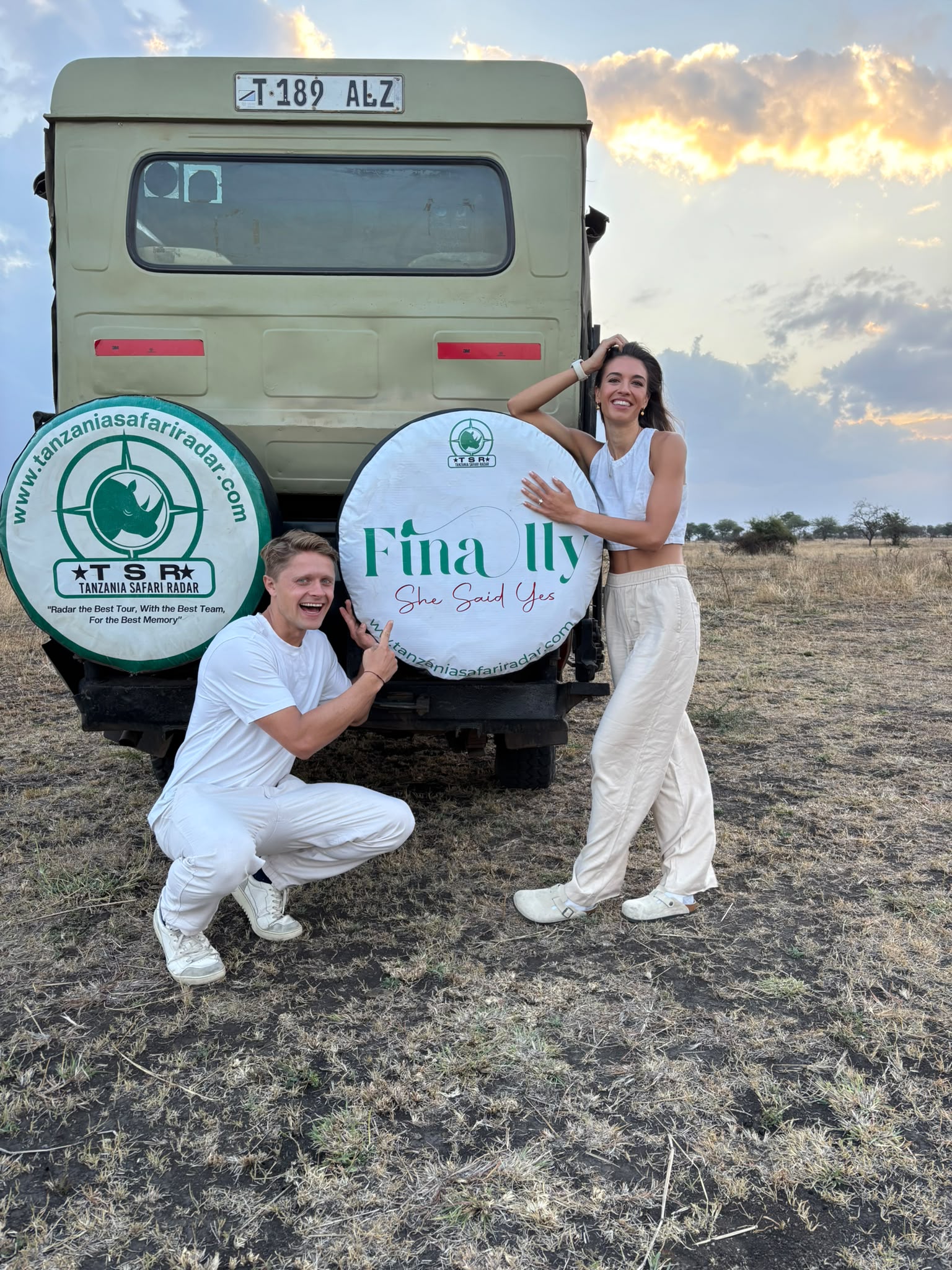 Couple holding hands while enjoying a romantic Tanzania safari