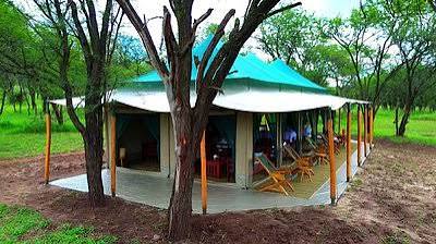 Scenic exterior view of Maboresho tented camps1 offering luxury safari lodging in Tanzania